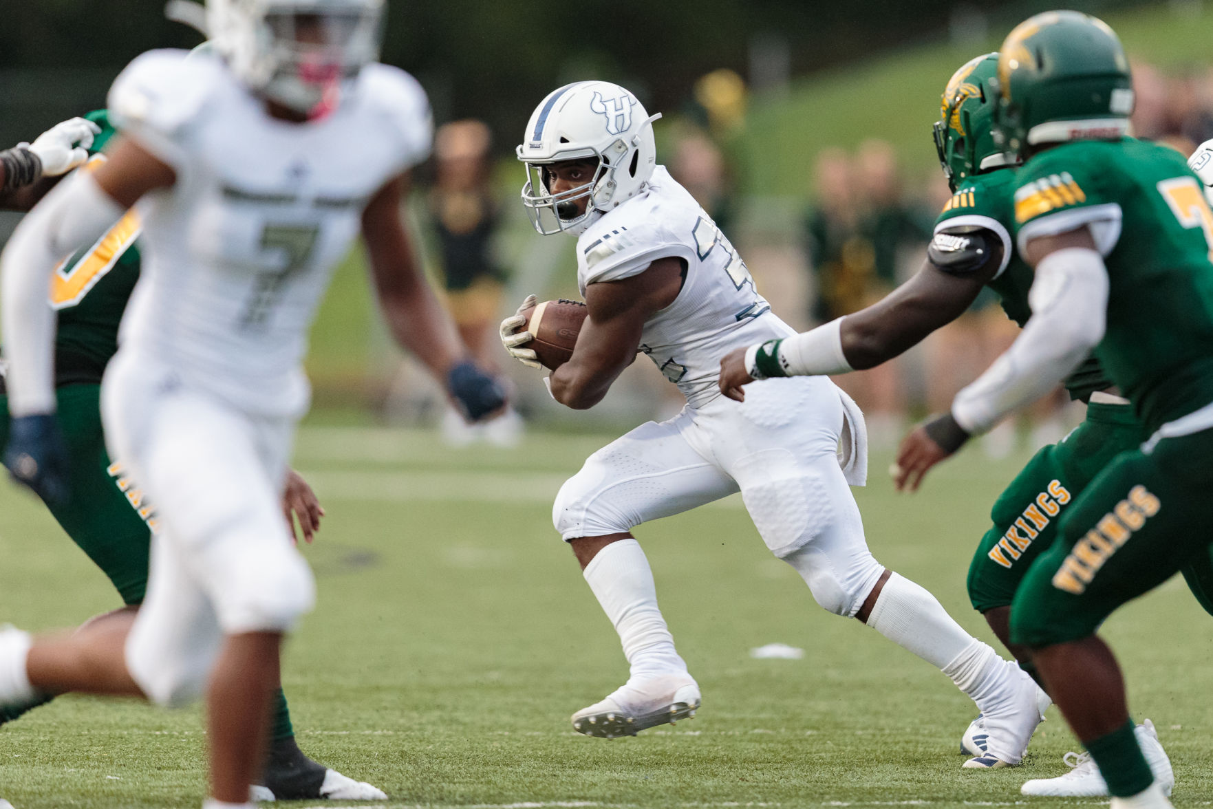 The Ragin' Bulls come from behind in the Battle of the Horns to defeat the Vikings 27-20.